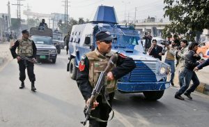 An armored car carrying Raymond Davis leaves a courthouse in Lahore, Pakistan. Copyright 2013 The New York Times Company