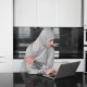 Muslim woman on laptop sexual harassment