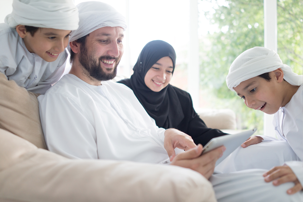 Muslim family sitting 